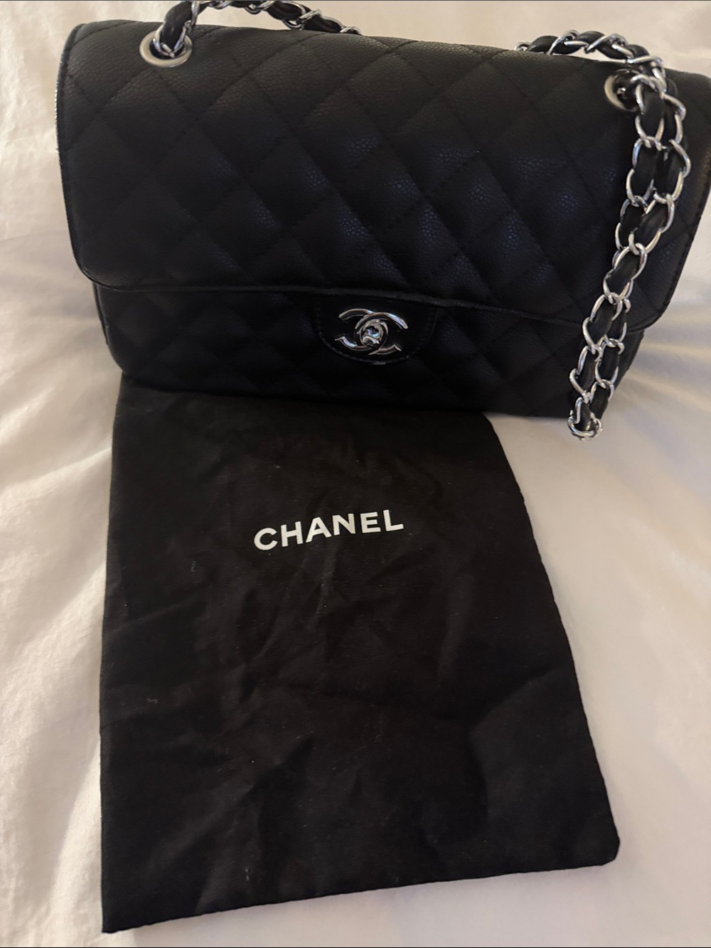 CHANEL Black Quilted Caviar Leather Shoulder Bag with Silver Chain